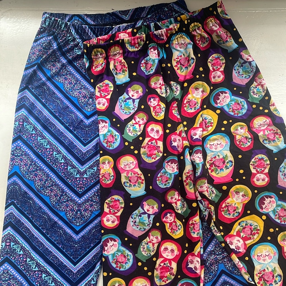 Two pairs Agnes & Dora S/M adult leggings fit US sizes 4-12. Near new condition